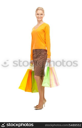 lovely woman with shopping bags over white&#xA;