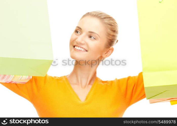 lovely woman with shopping bags over white&#xA;