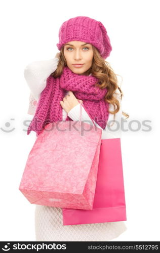 lovely woman with shopping bags over white&#xA;