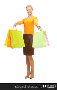 lovely woman with shopping bags over white&#xA;