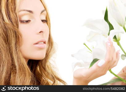 lovely woman with white madonna lily flower