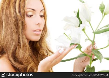 lovely woman with white madonna lily flower