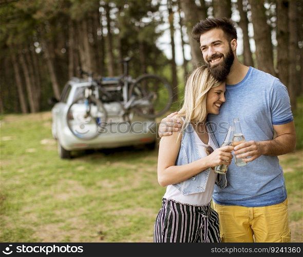 Lovely young couple enjoying in the nature