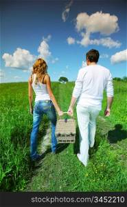 lovers go to picnic by green hill