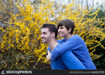 Lovers in the park dressed in blue