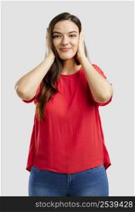 Lovey woman covering her ears with hands