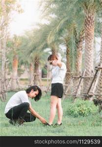 Loving asian couple enjoying in moments of happiness in the park. Boyfriend take care of lover, Happy romantic asia couple in love.