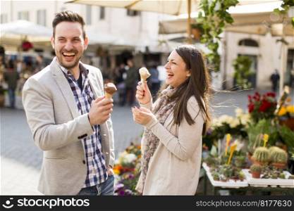 Loving couple having an ice cream in Rome