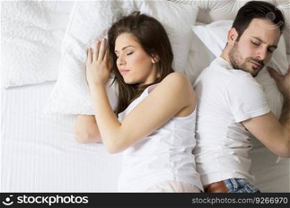 Loving couple in the bed