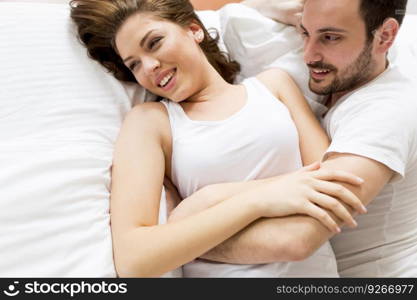 Loving couple in the bed