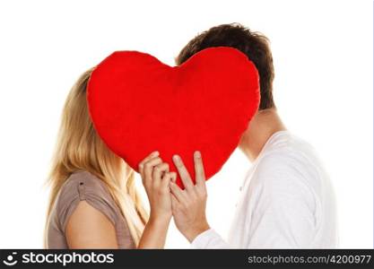 loving couple kissing behind a heart. love is beautiful. secret love
