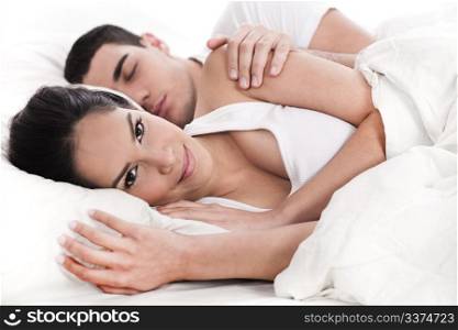 Loving embracing lying couple of woman and sleeping man over white background