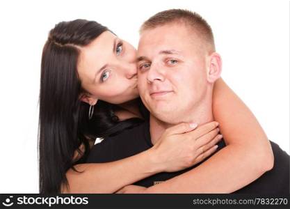 Loving embracing Portrait of a beautiful young happy smiling couple isolated