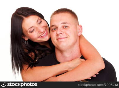 Loving embracing Portrait of a beautiful young happy smiling couple isolated young relaxing