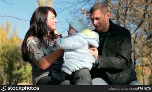 loving parents play with your baby
