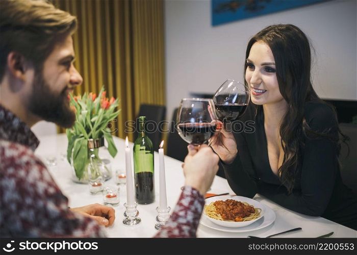 loving people enjoying wine dinner