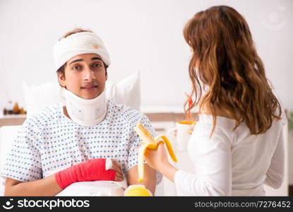 Loving wife looking after injured husband 