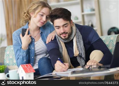 loving young couple analyzing their finances