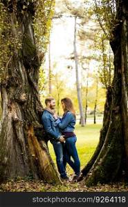 Loving young couple in the autumn park