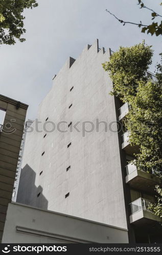 low angle building city with trees