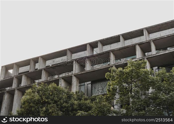 low angle concrete structure city with trees