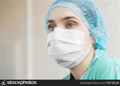 low angle nurse with mask hospital. High resolution photo. low angle nurse with mask hospital. High quality photo