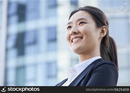 Low Angle of a Young Businesswoman Smiling
