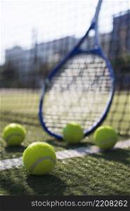 low angle tennis balls racket field