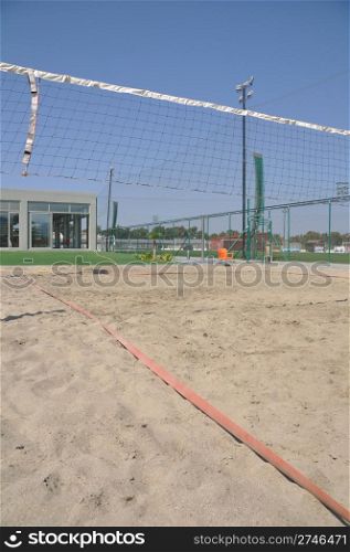 low angle view of a beach volleyball arena with gorgeous blue sky background