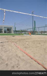 low angle view of a beach volleyball arena with gorgeous blue sky background