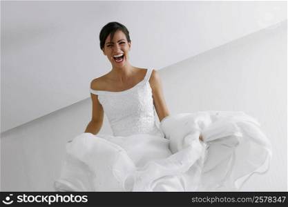 Low angle view of a bride smiling