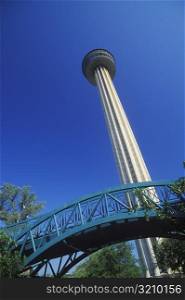 Low angle view of a bridge in front of a tower, Texas, USA