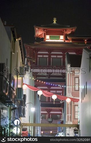Low angle view of a building in a city at night, Chinatown, Singapore