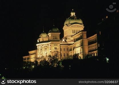 Low angle view of a building lit up at night, Berne, Berne Canton, Switzerland