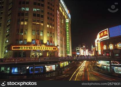 Low angle view of a building lit up at night, China