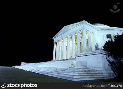 Low angle view of a building lit up at night, Jefferson Memorial, Washington DC, USA