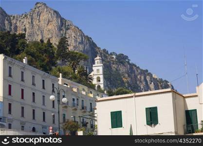 Low angle view of a building with a cliff in the background, Capri, Campania, Italy