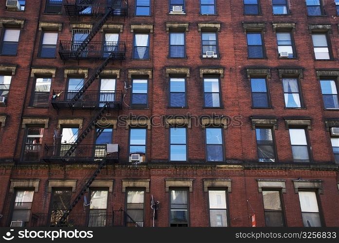 Low angle view of a building with fire escapes