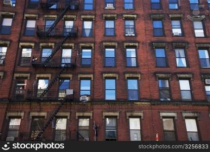 Low angle view of a building with fire escapes