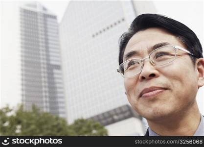 Low angle view of a businessman smiling