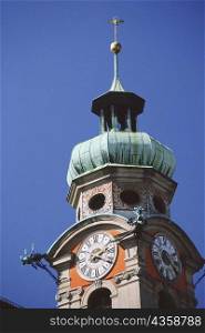 Low angle view of a clock tower, Innsbruck, Austria