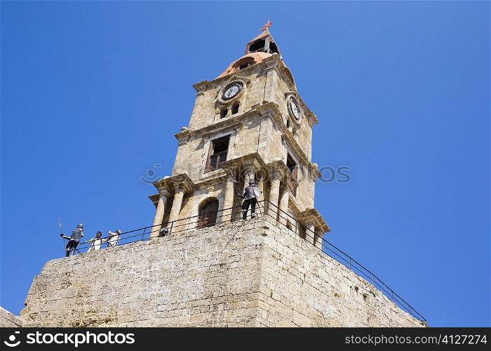 Low angle view of a clock tower, Mosque of Suleyman, Rhodes, Dodecanese Islands, Greece