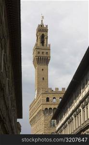 Low angle view of a clock tower, Pallazo Vecchio, Piazza Della Signoria, Florence, Italy