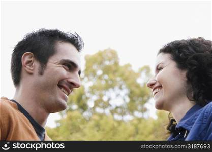 Low angle view of a couple smiling