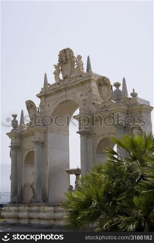 Low angle view of a fountain, La Fontana dell&acute;Immacolatella, Naples, Naples Province, Campania, Italy