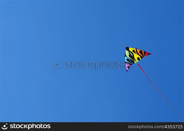 Low angle view of a kite flying in the sky
