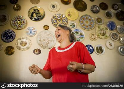 Low angle view of a mature woman laughing