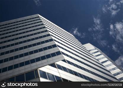 Low angle view of a modern office building against sky, Minneapolis, Hennepin County, Minnesota, USA