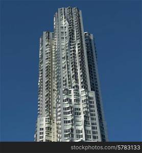 Low angle view of a modern skyscraper, Manhattan, New York City, New York State, USA