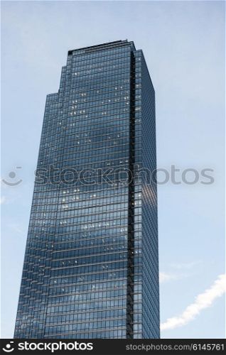 Low angle view of a modern skyscraper, West End, Dallas, Texas, USA